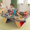 The KidKraft Waterfall Junction Train Set and Table combines a wooden play table and a 112 piece Train Set, colourfully illustrated, durable play surface