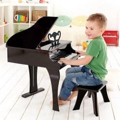 Hape Grand Piano is an elegant wooden toy 30 key Grand Piano, in classic black,with an excellent sound and is sure to delight budding concert pianists.