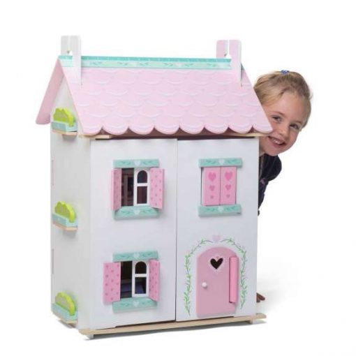 Le Toy Van Sweetheart Cottage Dolls House is a wonderfully painted and decorated wooden dollhouse with hearts and flowers motif