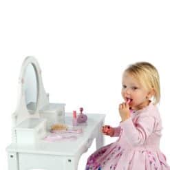 Tidlo Dressing Table is a beautiful white dressing table with pretty floral decoration, comes complete with a stool, built-in mirror, and two drawers