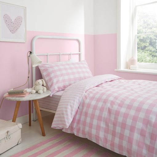 The Check & Stripe Duvet Cover and Pillowcase Set by Bianca Kids, features a classic pink and white check design one one side and a reverse striped pattern