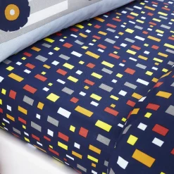 Construction Fitted Sheet by Catherine Lansfield in navy, with pops of primary colours, playful geometric shapes, a great addition to any kids room.