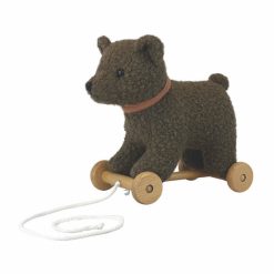 Egmont Pull Along Raoul the Bear is a cute and cuddly playtime companion for young children. The plush toy has a sturdy wooden base with wheels that make it easy for children to pull the bear behind them as they move around.