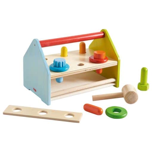 Haba Childrens Tool Box a handy portable tool box and hammering bench, all in one, a three hole template included to guide the three screws into the board.