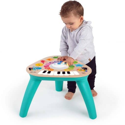 Hape Baby Einstein Clever Composer Tune Table is a wooden activity center featuring award-winning Magic Touch technology
