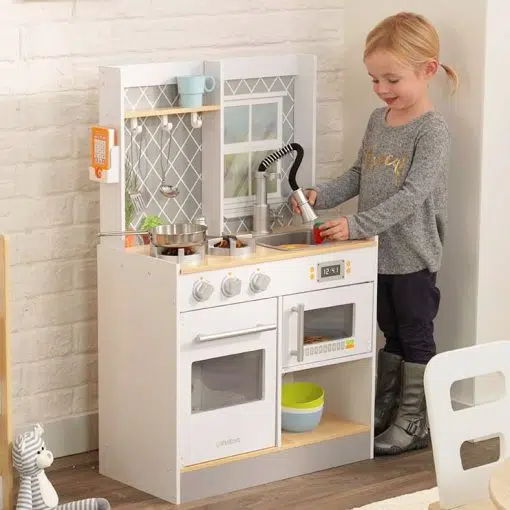 Kidkraft Lets Cook Play Kitchen is a realistic looking Wooden kids Kitchen with all your little Baker needs to get going.