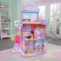 Kidkraft Candy Castle Doll House, a super-sweet large wooden dollhouse, decorated in a rainbow palette across three levels with seven play areas,