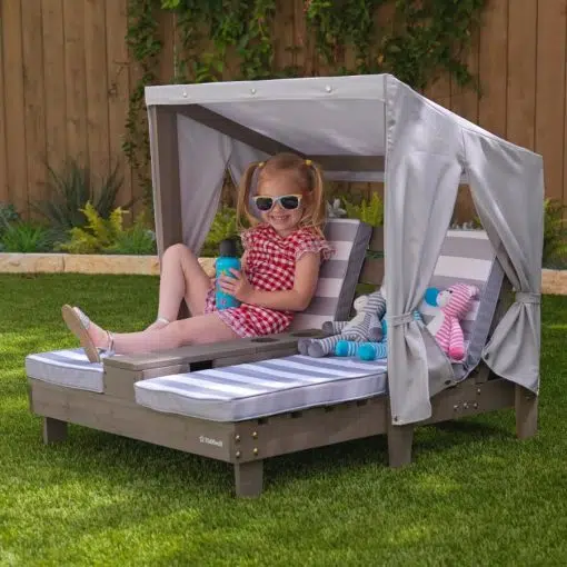 Kidkraft weather resistant double chaise with cupholders and a grey canopy