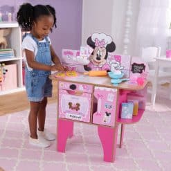Kidkraft Minnie Mouse Bakery & Café, a toddler-sized pink wooden play kitchen that lets pint-sized chefs test out all aspects of baking including following recipes, adding ingredients, rolling out dough, cutting out cookies and cooking in the oven.
