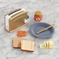 Kidkraft Modern Metallic Toaster in a shiny metallic colour comes with bread, a butter knife, jelly and a stick of butter that kids can really slice.
