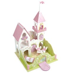 Le Toy Van Fairybelle Palace is a beautiful painted wooden fairy castle with highly detailed floral artwork, featuring a high tower with flag, a princess balcony, a drawbridge, and opening shutters and windows.