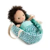 The lovely Lilliputiens Baby Doll Ari lies snugly in her reversible bassinet underneath her blanket. When she wakes, it is time to change her nappy.