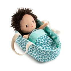 The lovely Lilliputiens Baby Doll Ari lies snugly in her reversible bassinet underneath her blanket. When she wakes, it is time to change her nappy.