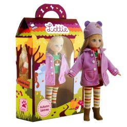 Lottie Doll Autumn Leaves has blond hair, blue eyes and wears, a Duffel coat, Scarf, Hat, Boots, Long sleeved t-shirt, Corduroy skirt & Striped leggings