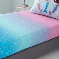 This Mermaid Single Fitted Sheet by Catherine Lansfield comes in pink and turquoise with silver detailing.
