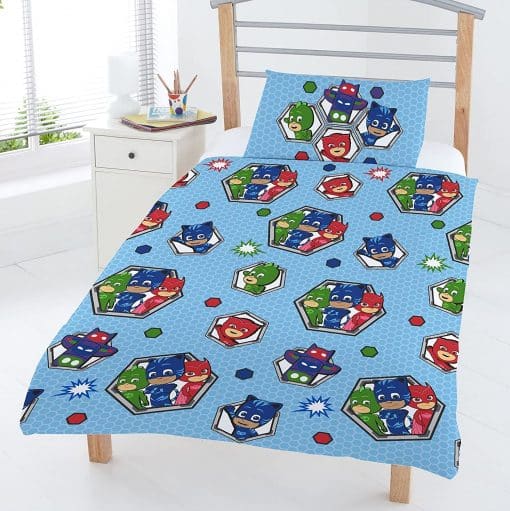 PJ Masks Badges Toddler Duvet Set featuring mini superheroes Catboy, Owlette and Gekko with their totem pole shaped headquarters