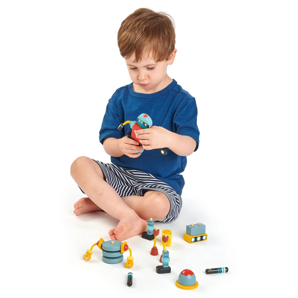 Tender Leaf Robot Construction 17 Piece Play Set includes three brightly coloured, retro-style robots made from solid rubberwood.