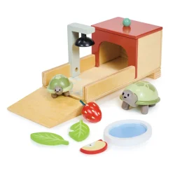 Tenderleaf Toys Tortoise Pet Set features a mummy and baby tortoise and their cozy home, complete with heater lamp and bedroom area.