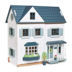 Tenderleaf Dovetail Dollhouse, is a large spacious and ultra-stylish, traditional 1:12 scale wooden doll house with six rooms laid out over three levels, ready to be furnished.